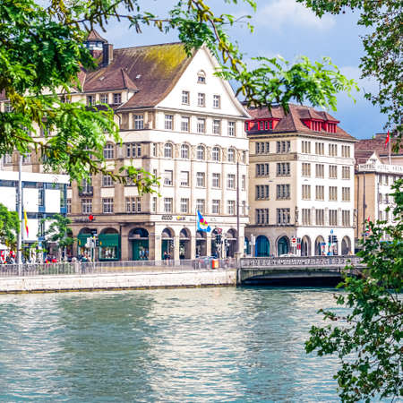 Streets and historic Old Town buildings near main railway train station Zurich HB, Hauptbahnhof, Swiss architecture and travel destination in Zurich, Switzerlandのeditorial素材