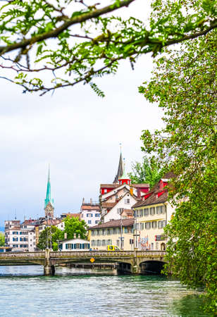 Streets and historic Old Town buildings near main railway train station Zurich HB, Hauptbahnhof, Swiss architecture and travel destination in Zurich, Switzerlandのeditorial素材