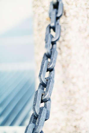 Metal chain closeup, marine backgroundの写真素材