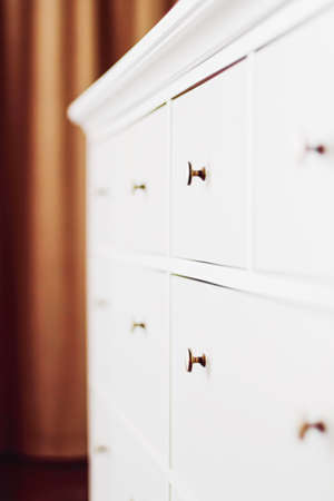 White dresser in bedroom, furniture and home decorの写真素材