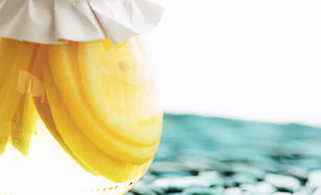 Canned sugared lemon slices in sweet syrup, food and dessert