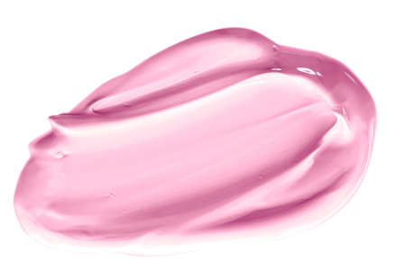 Blush pink beauty cosmetic texture isolated on white background, smudged makeup emulsion cream smear or foundation smudge, cosmetics product and paint strokesの写真素材