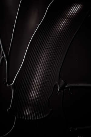 Black cream texture cosmetic product and makeup backdrop for luxury beauty brandの写真素材