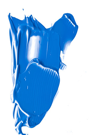 Cobalt blue beauty cosmetic texture isolated on white background, smudged makeup smear or cosmetics product smudge, paint brush strokesの写真素材