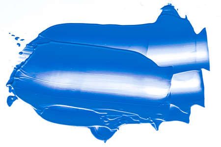 Cobalt blue beauty cosmetic texture isolated on white background, smudged makeup smear or cosmetics...