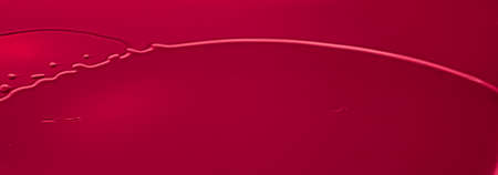 Red lipstick or lip gloss texture as cosmetic background, makeup and beauty cosmetics product for luxury brand, holiday flatlay backdrop or abstract wall art and paint strokesの写真素材
