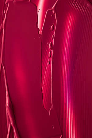 Red lipstick or lip gloss texture as cosmetic background, makeup and beauty cosmetics product for luxury brand, holiday flatlay backdrop or abstract wall art and paint strokesの写真素材
