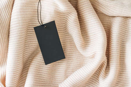 Cosy fabric and clothing tag as organic material background, sustainable fashion and brand label...