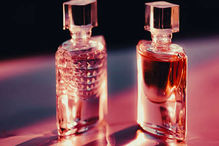 Two perfume bottles at sunset, perfumery as luxury beauty and cosmetic productの写真素材