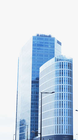 Corporate office building in financial district, modern skyscraper in city downtown, commercial real...