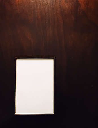 Blank picture frame on wooden background, luxury home decor and interior design, poster print and...