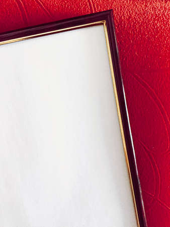 Blank picture frame detail on red background, luxury home decor and interior design, poster print...