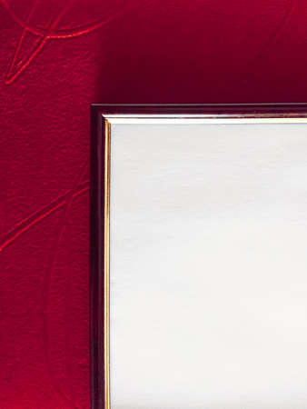 Blank picture frame detail on red background, luxury home decor and interior design, poster print and printable art mockupの写真素材