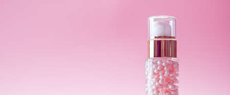 Skincare bottle on pink background, luxury beauty and cosmetic products