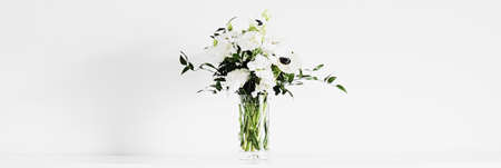 Bouquet of flowers in vase and home decor details, luxury interior design