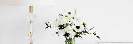 Bouquet of flowers in vase and home decor details, luxury interior designの写真素材