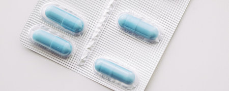 Blue pills and capsules as nutrition supplement, wellness and health care