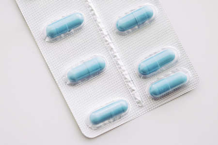 Blue pills and capsules as nutrition supplement, wellness and health care