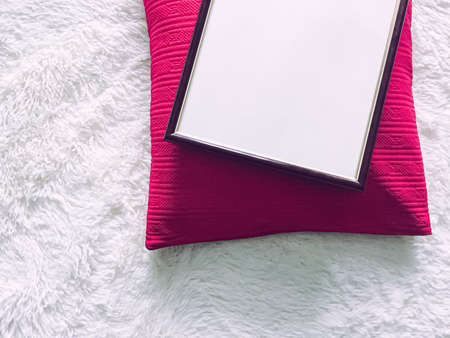 Black wooden frame and pink pillow for print mockup, luxury home decor and interior design, poster and printable artの写真素材