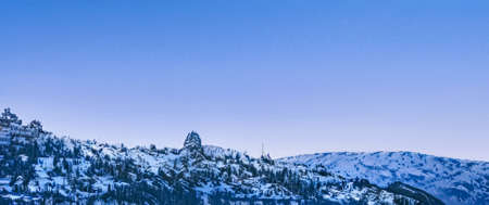 Winter wonderland and Christmas landscape. Snowy mountains covered with snow as holiday backgroundの写真素材