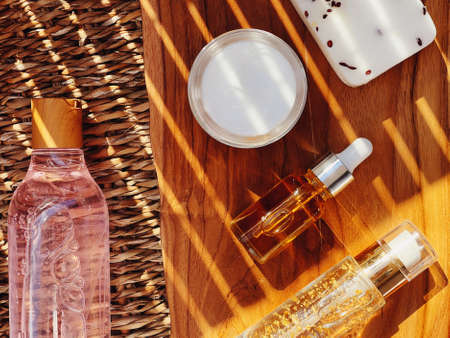 Skincare, spa and body care cosmetic products on wooden background, flatlay design, organic beauty routine and natural cosmetics conceptの写真素材