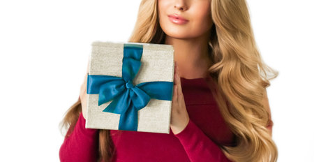 Birthday, Christmas or holiday present, happy woman holding a green gift or luxury beauty box...