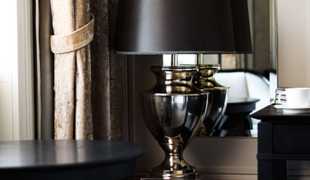 Home decor and interior design, luxury lamp and coffee table in elegant classic styled room,...