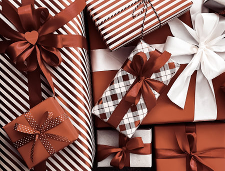 Holiday gifts and wrapped luxury presents, chocolate gift boxes as surprise present for birthday,...