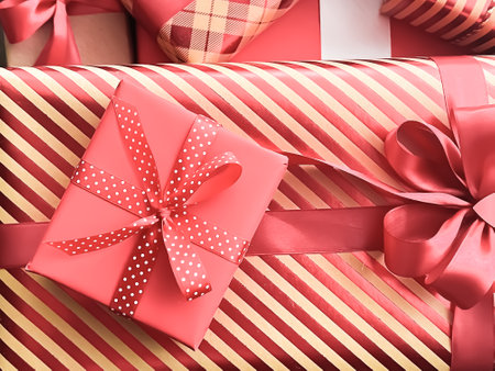 Holiday gifts and wrapped luxury presents, coral gift boxes as surprise present for birthday, Christmas, New Year, Valentines Day, boxing day, wedding and holidays shopping or beauty box delivery conceptの写真素材