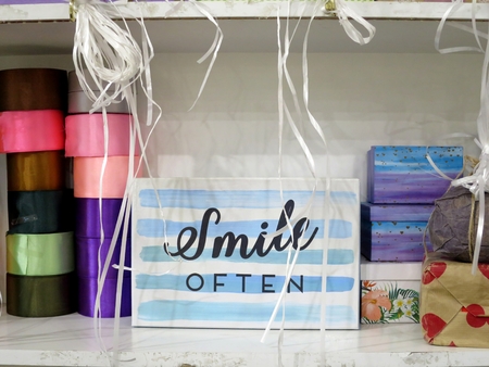 Smile sign, ribbons, presentsの写真素材