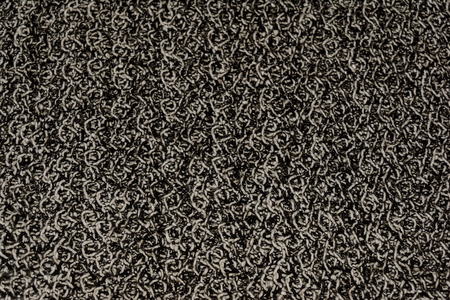 Horizontal background, texture knitting. The fine pattern. Artificial wool.