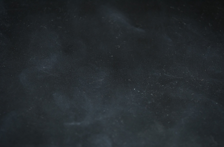 Abstract dark background. The texture of dirty scratched plastic. Rectangular.の写真素材