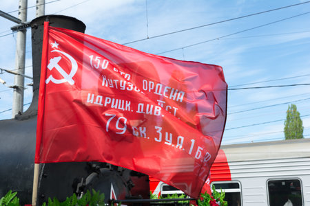 SARATOV, RUSSIA - MAY 6, 2017: Fragment of an old military locomotive with a red flag division. Mobile museum of the Great Patriotic War.のeditorial素材