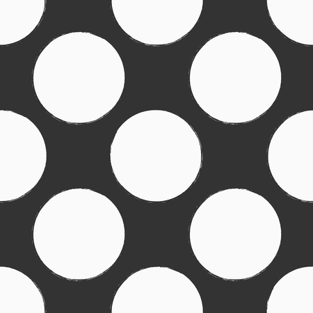 Polka dot. Painted by hand with rough brush. Seamless pattern. White circles on  black background. Vector illustration. Sketch, grunge, ink.のイラスト素材
