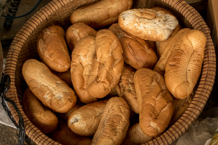 Dry Bread/ Vietnamese Baguette in Traditional Bamboo Basket - Leftover Foodの写真素材