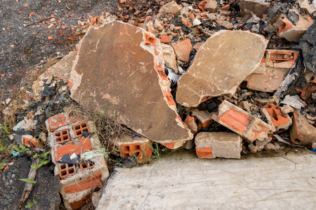 Big Heap of Concrete/ Cement Junk - Brick Wall Fragments with Plastic Garbage/ Trash - Construction. Asian Gardenの写真素材