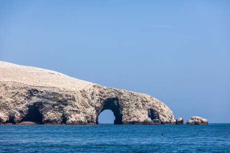 Rocks and arches Ballestas Islands, Paracas National Reserve, Peruの写真素材