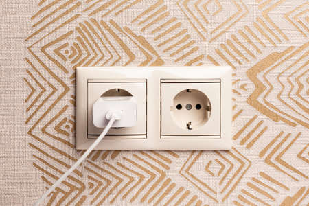European double white electrical outlet socket, included charging for phone.
