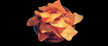 Crispy potato chips served with a dip for a perfect snack time pleasure