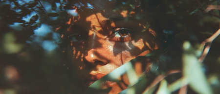 Portrait blending human features with nature through double exposure technique