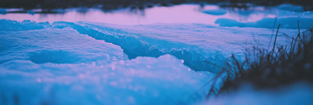 Surreal frozen tundra landscape with cracked ice and vibrant lightingの素材