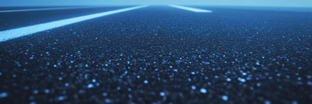 Close-up view of textured asphalt on a runway highlighting aggregate and markingsの素材