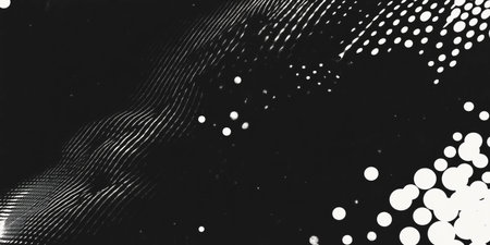Grunge halftone texture with chaotic dots pattern on a black backgroundの素材