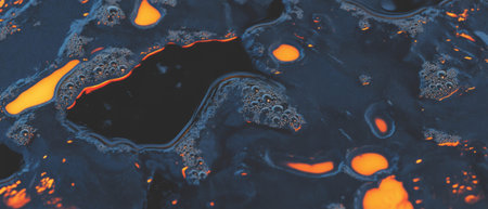 Smooth seamless pattern texture of thick black motor oil with vibrant orange highlightsの素材