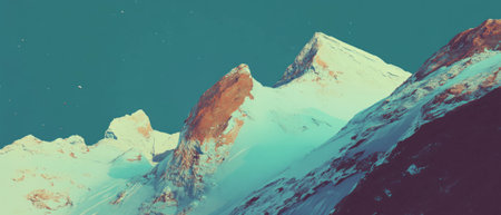 Jagged mountain peaks rise with rocky surfaces and glistening snow caps in clear skyの素材