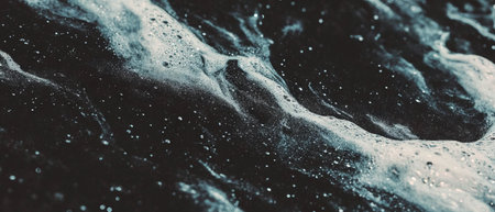 Textured black chalkboard template offering a classic and educational backdrop for designsの写真素材