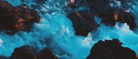 Lava field meets ocean waves in stunning contrast of black rock and vibrant blueの素材