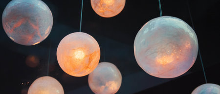 Floating magical light orbs create an ethereal ambiance in a mystical spaceの素材