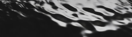 Close-up view of flowing water with halftone dots creating dynamic movement effectの素材