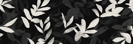 Stylized leaf and flower pattern inspired by African design in black and white tonesの素材